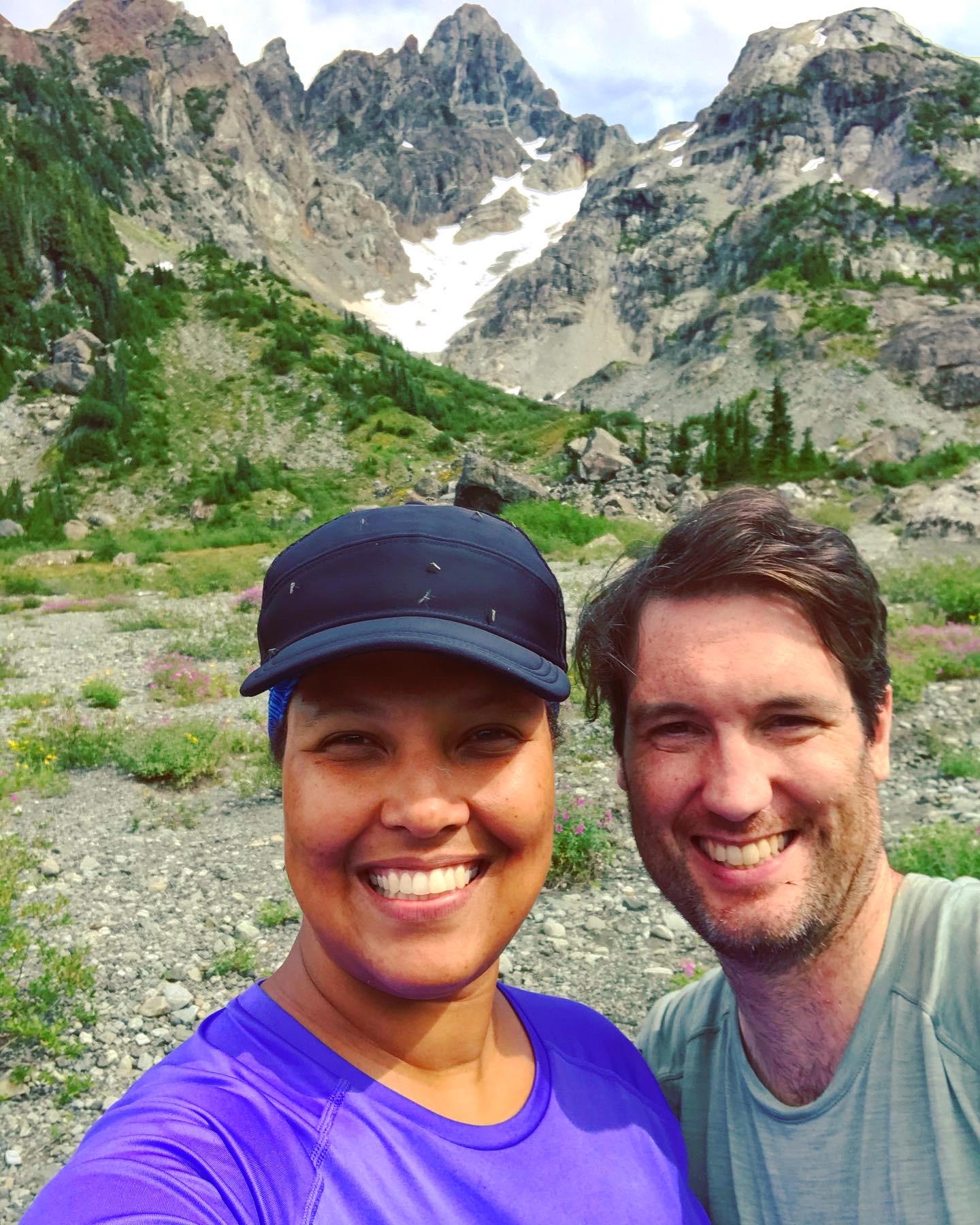 Amanda Banks & her Husband hiking by a mountain
