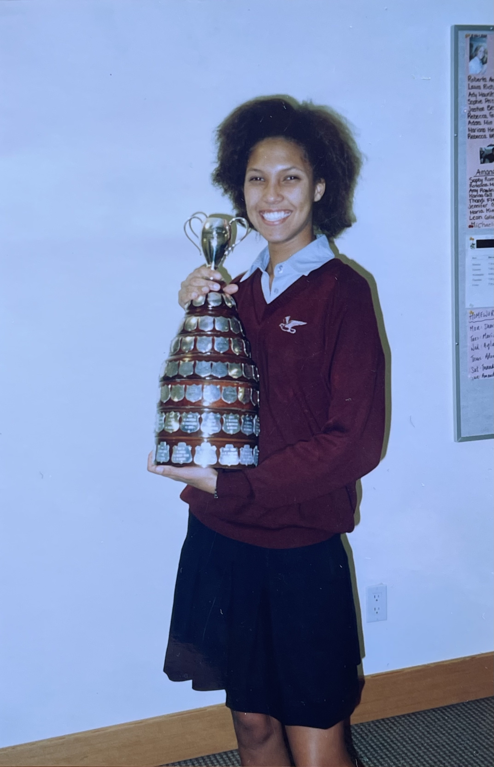 Amanda Banks as a teenager at Shawnigan Lake School holding a trophy