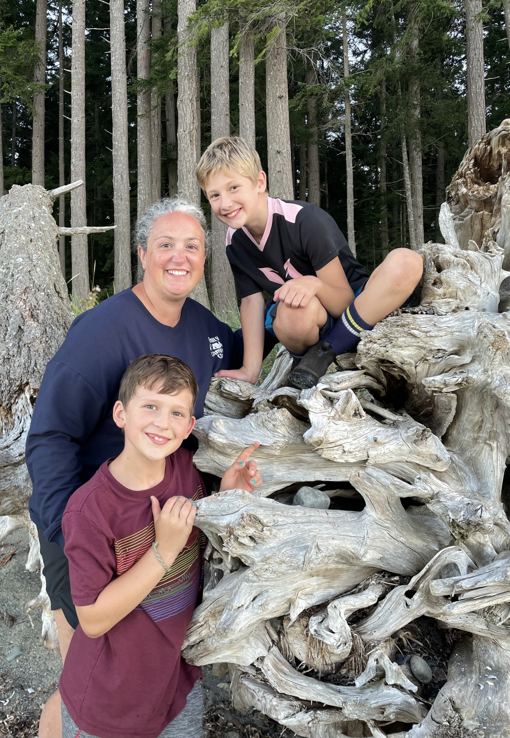 Angela Morehouse, Master's Student, with her two sons at the beach