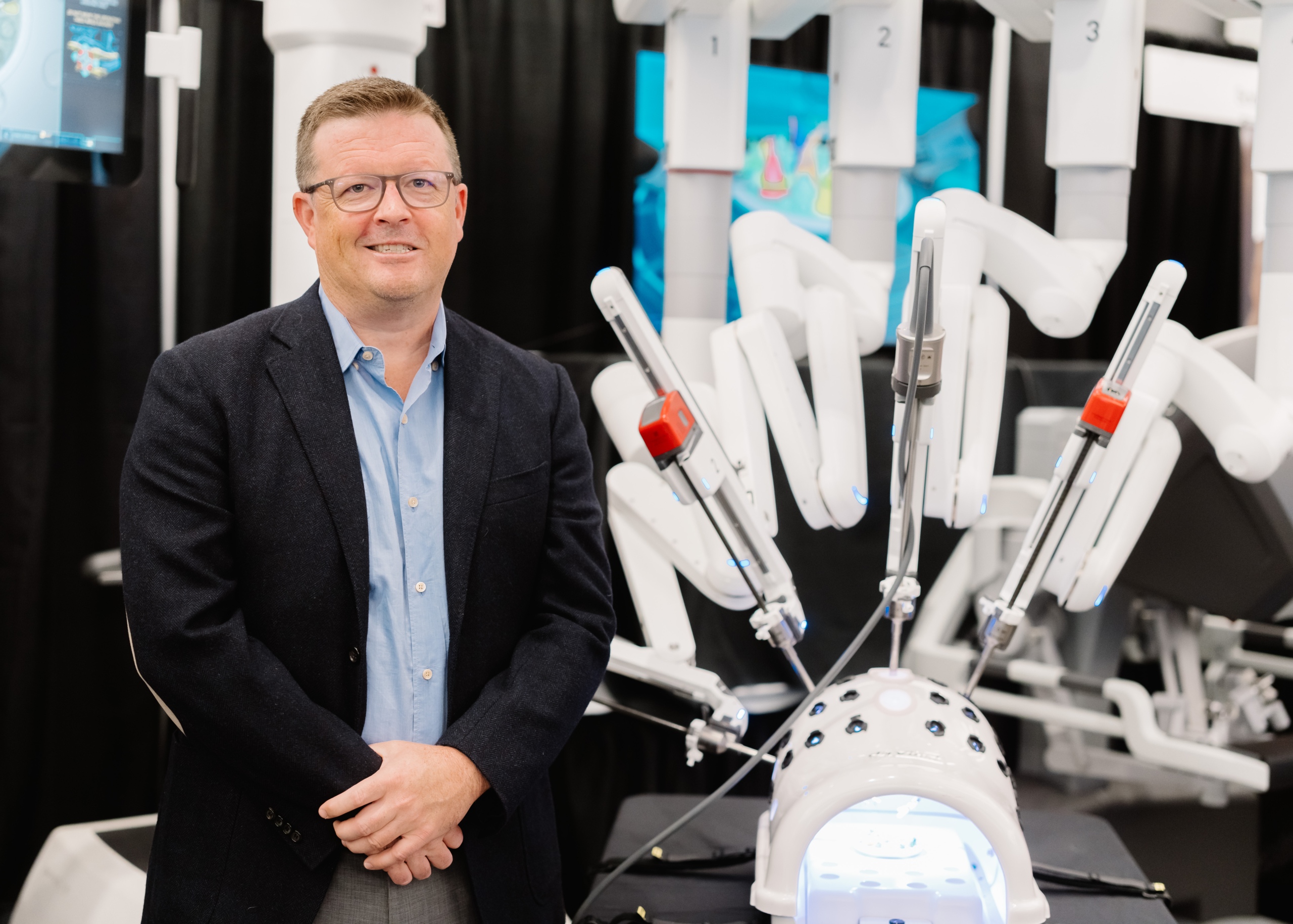 Dr. Jeff McCracken with the incoming surgical robot