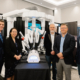 Urologists, Dr. Michael Metcalfe, Dr. Linda Lee, Dr. Iain McAuley, Dr. Jeff McCracken, & Dr. Greg Hosier with the da Vinci Surgical Robot