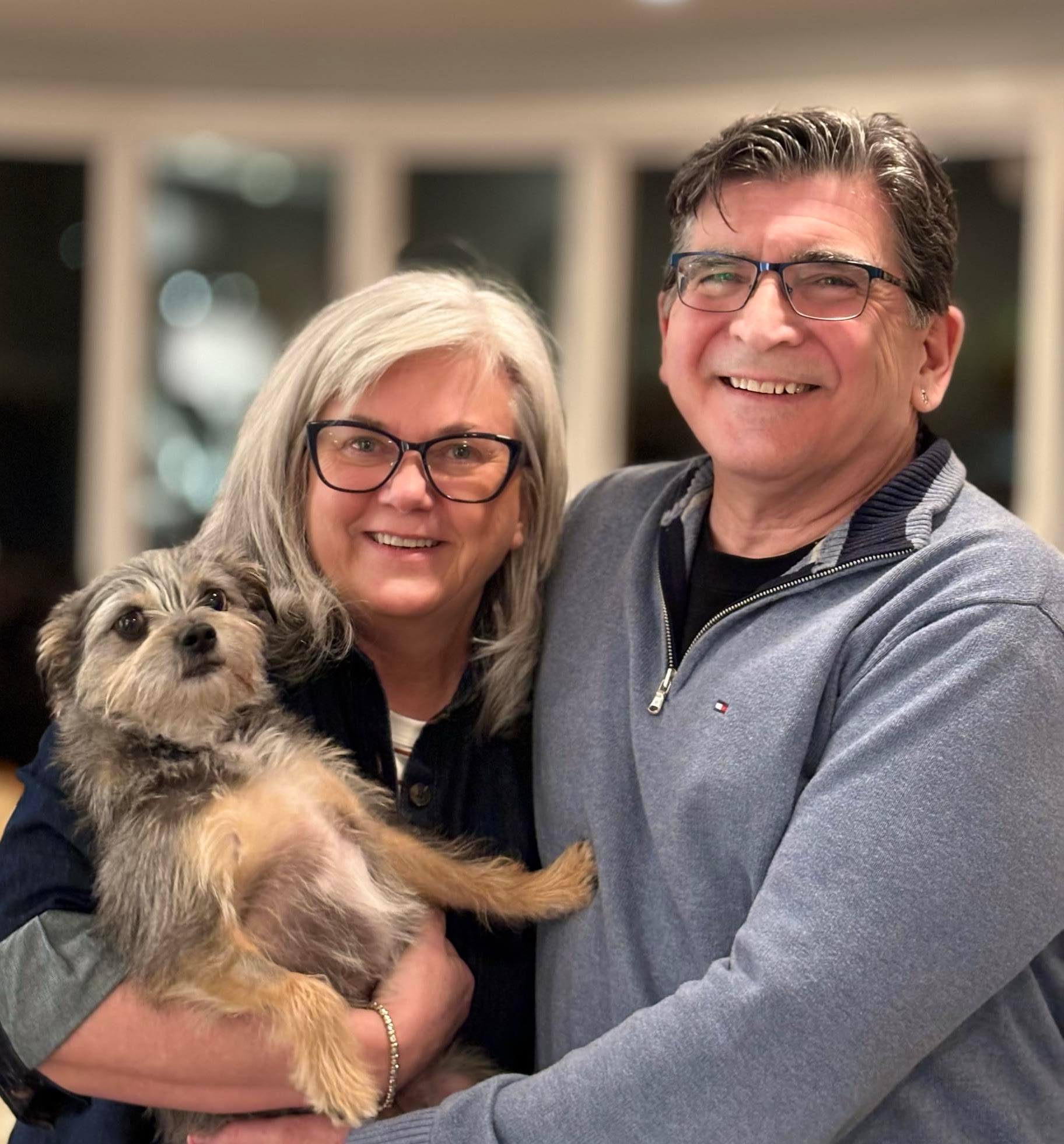 Joan with her husband Chris Graham, and their dog