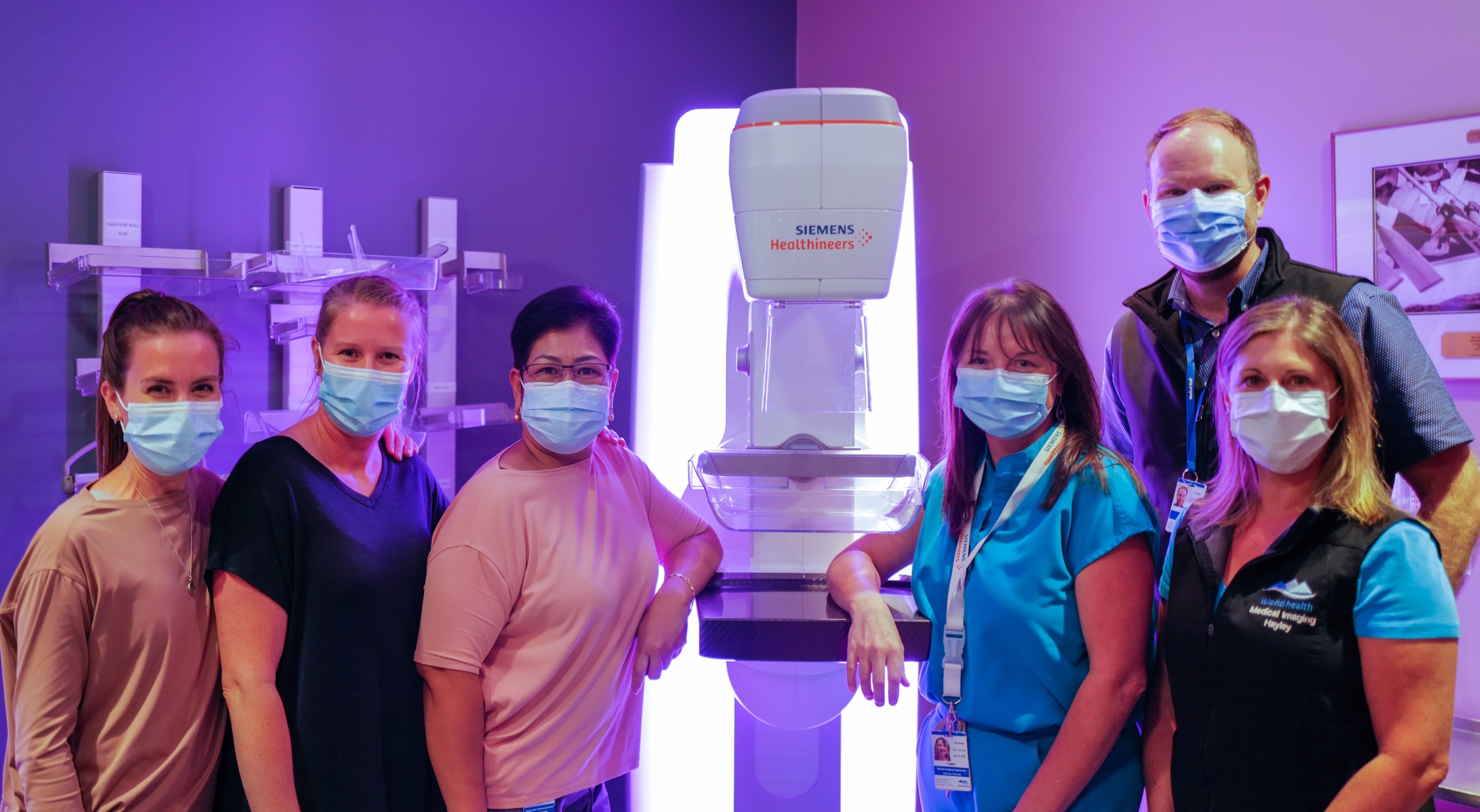 The VGH Mammography team stands with a donor-funded Mammography System